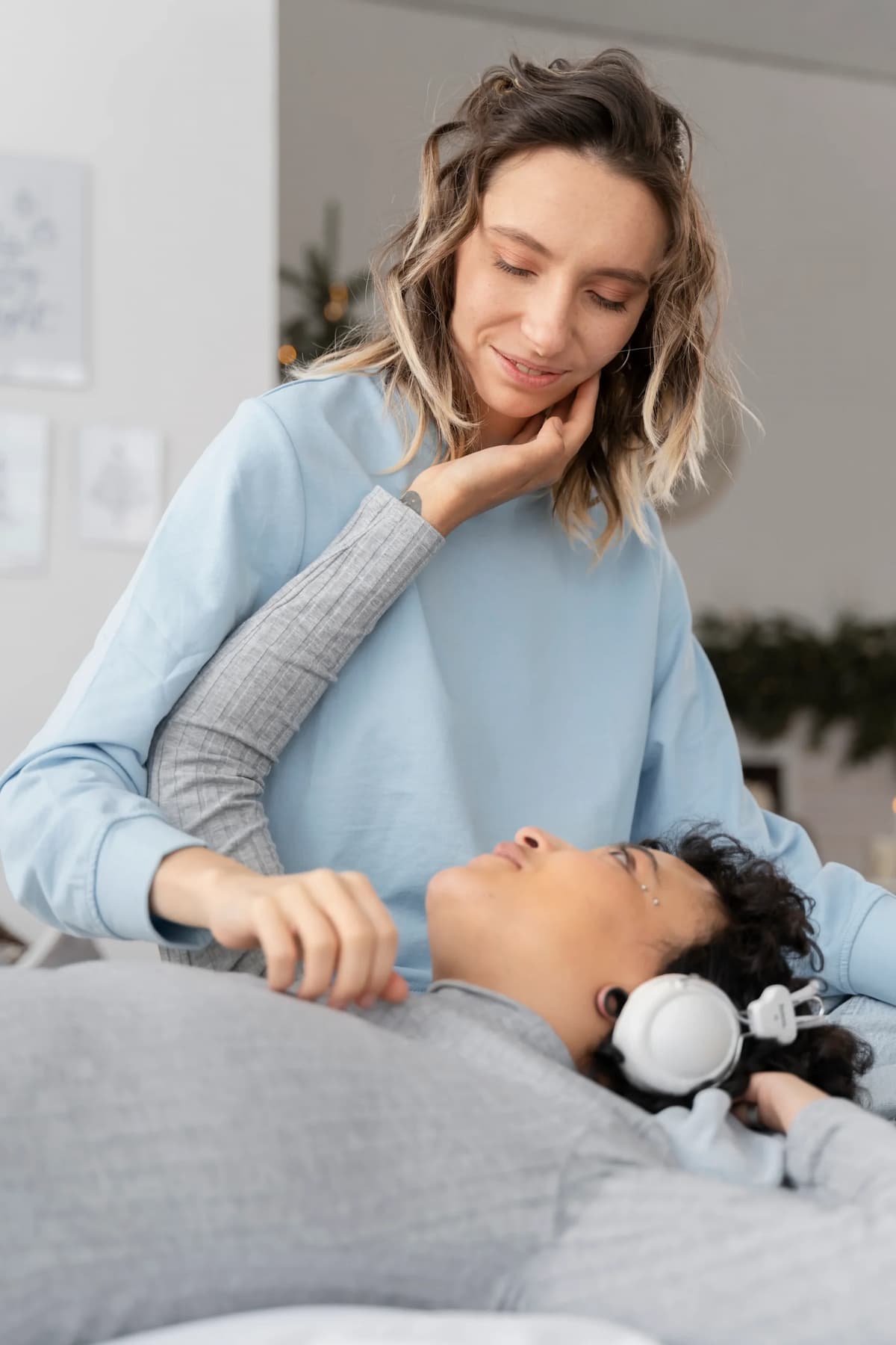 Two woman comforting each other about their mental health care